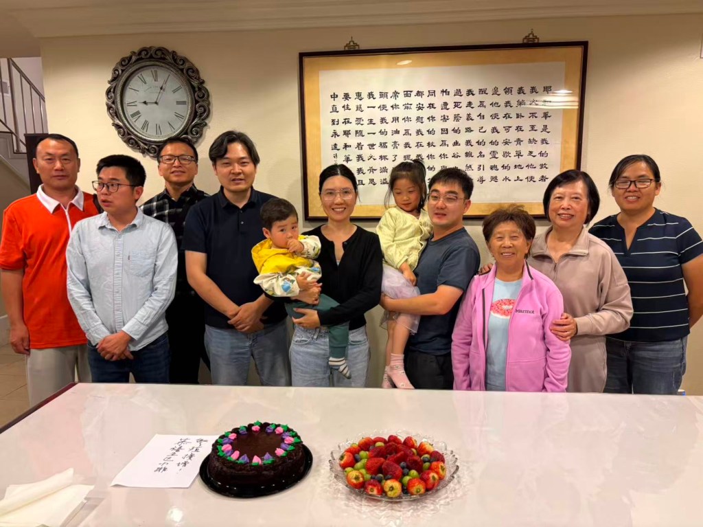 涂炎弟兄、何玉勤姊妹受浸归主